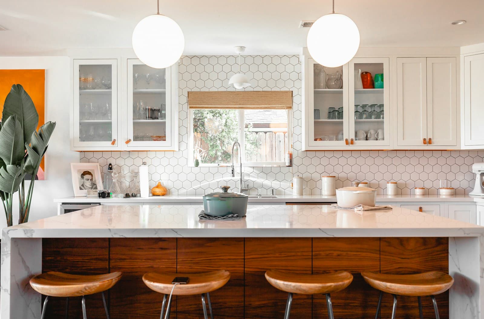 Wood and white kitchen with glass cupboards